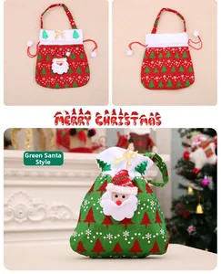 Detail of Christmas gift bags with Santa Claus patches, drawstring and plush pom-poms