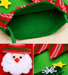Close-up of Santa Claus 3D applique and fine stitching on brushed fabric gift bag