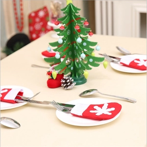 Mini Christmas stocking cutlery holder with snowflake design for holiday table decor