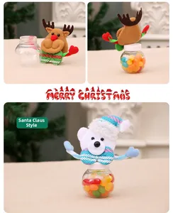 Close-up of plush reindeer and Santa Claus miniature Christmas candy jars with transparent balls