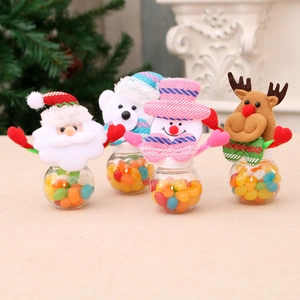 Set of 4 Christmas candy jars featuring Santa, Polar Bear, Snowman, and Reindeer designs
