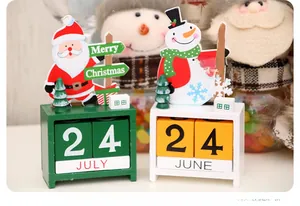 Detail of wooden Christmas advent calendar with Santa and Snowman blocks
