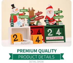 Close-up of wooden Christmas calendar blocks with Santa, Snowman and Reindeer figurines
