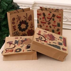 Christmas kraft paper gift bags featuring festive Santa and snowman prints with sturdy handles