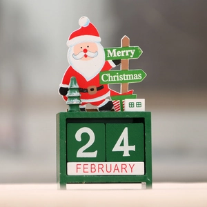 Green wooden Christmas countdown calendar featuring Santa Claus and manual date blocks