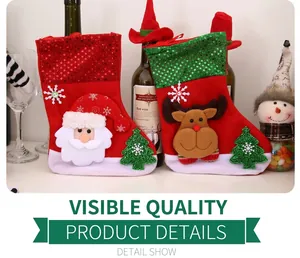 Detail of 3D Santa and Reindeer Christmas stockings with sequins and white plush trim