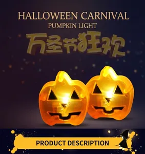 Detail showing two orange glowing LED pumpkin lanterns with festive Halloween graphics