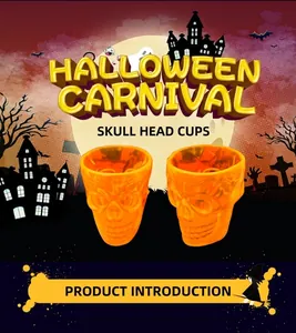 Set of two orange translucent skull cups for Halloween parties with spooky castle graphics