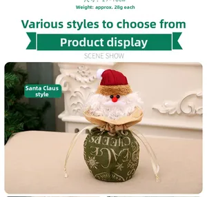 Detail of large Santa Claus burlap drawstring gift bag with snowflake and Cheers print