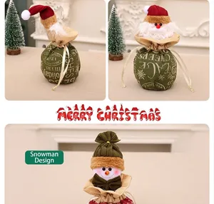 Close-up of Santa and Snowman burlap Christmas drawstring gift bags for candies