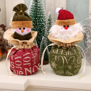 Large linen Christmas drawstring gift bags featuring Santa and snowman holiday designs