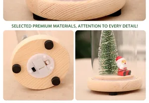 Close-up of wooden base with LED power switch and non-slip pads for Christmas glass dome