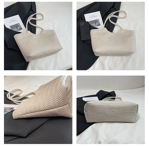 Detail view showing beige woven PU leather tote bag texture and large capacity structure