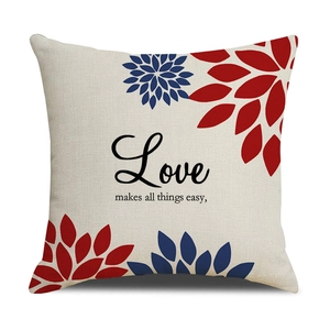 Detail of linen pillowcase with Love makes all things easy quote and floral corner prints