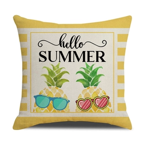 Detailed view of linen cushion cover with pineapple print and Hello Summer text