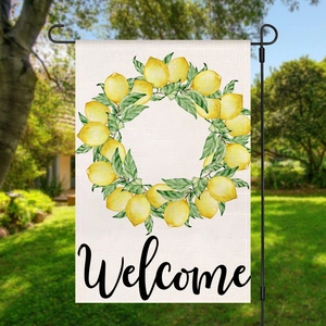 Close-up of garden flag with watercolor lemon wreath and Welcome text on metal hanger