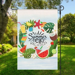 Detail view of Summer Vacation garden flag with watermelon and leaf patterns on a stand