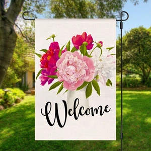 Detailed garden flag with pink peonies and Welcome text on a black metal stake stand
