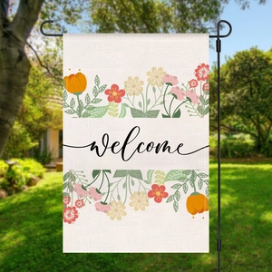 Detail of floral Welcome garden flag with vibrant flowers on a durable burlap fabric