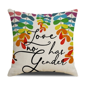 Detail of linen pillowcase with rainbow leaf design and Love has no Gender text