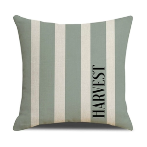 Sage green and cream striped square pillow cover with black HARVEST text print