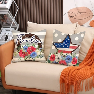 Independence Day throw pillow covers with American flag patterns on a beige sofa