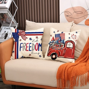 American Independence Day pillowcase with red truck and flag on a beige sofa