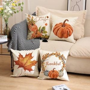 Set of 4 autumn pumpkin linen pillow covers with maple leaf motifs and fall greetings