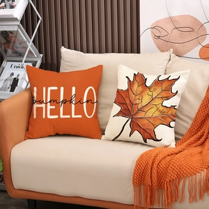 Fall linen pillow cases with Hello Pumpkin text and autumn maple leaf prints