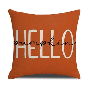 Autumn orange linen pillow cover featuring white HELLO pumpkin print for fall decor