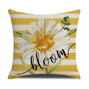 Linen decorative pillow cover with yellow stripes, daisy print and 'bloom' lettering
