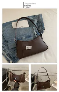 Vue détaillée du sac baguette marron café en similicuir avec fermoir rotatif argenté