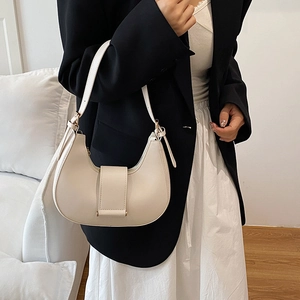 Chic beige hobo bag for women with minimalist half-moon shape and shoulder strap