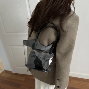 Frosted PVC clear jelly tote bag with black inner pouch and letter print on strap