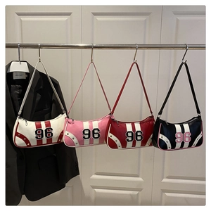 Collegiate style armpit bags with number 96 embroidery and metal studs in four colors