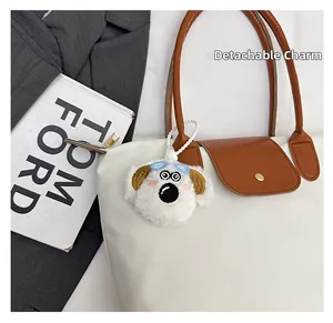 Sac cabas en nylon blanc avec anses brunes et breloque chien en peluche détachable