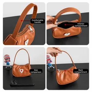 Detailansicht der braunen Leder-Achseltasche mit Größenvergleich und Innenraum-Details