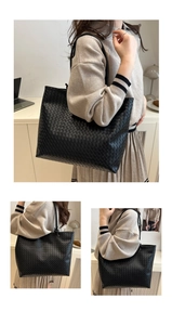Detail of hand-woven premium leather tote bag with elegant diagonal grid texture in black