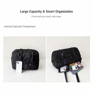 Detailed comparison showing size with phone and interior storage of heart-quilted tote bag