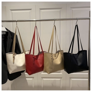 Litchi pattern leather tote bags in four colors with long shoulder straps and branding