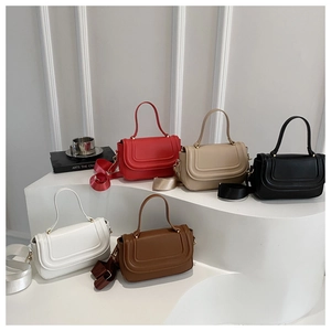 Detailed display of semi-circular saddle bags in five colors with wide straps