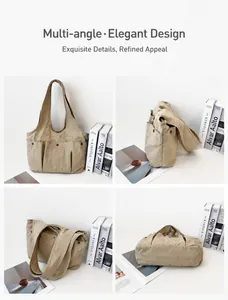 Detail view of beige canvas tote bag with three front pockets and metallic rivets