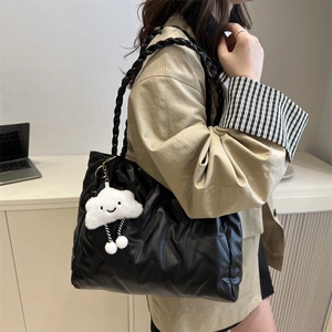 Black large capacity faux leather tote bag with braided shoulder strap and cloud charm