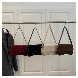 Minimalist faux suede baguette bags in burgundy, black, cream, and brown with wave base