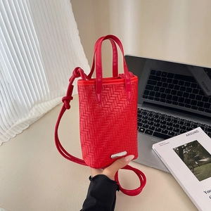 Minimalist red woven texture mini tote bag with dual handles and long shoulder strap