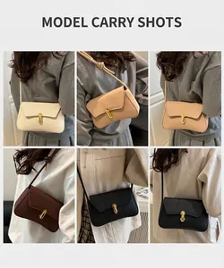 Detailed view of minimalist crossbody flap bags in five colors with gold swivel locks