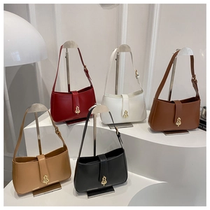 Five crescent shoulder bags in various colors with golden gourd-shaped hardware detail