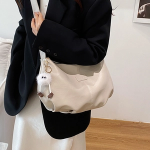 Retro pleated cream hobo crossbody bag in soft leather with cute plush pendant charm