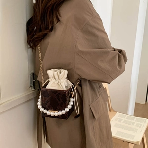 Brown snake skin square box bag with pearl top handle and gold chain strap