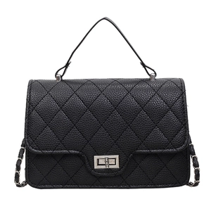 Quilted black leather crossbody bag with silver twist lock and chain strap for women